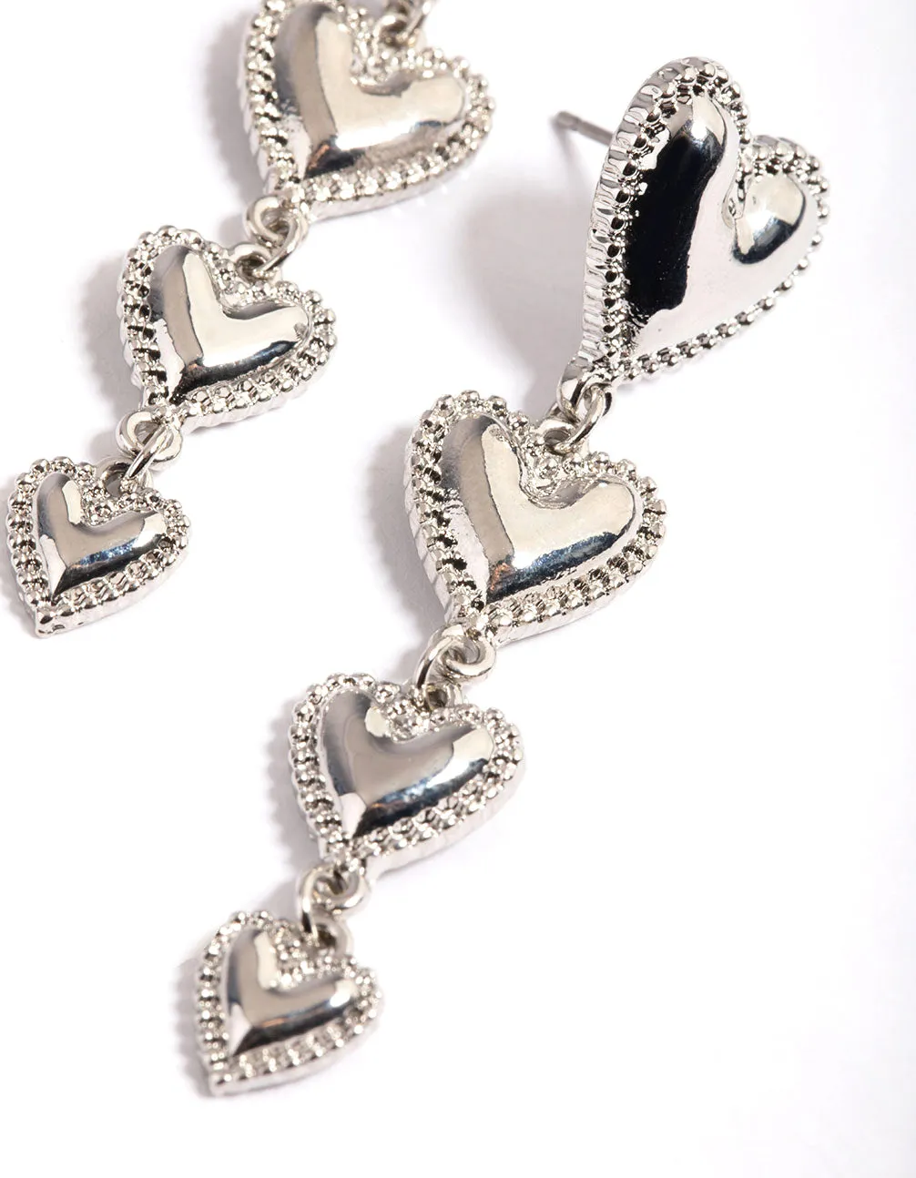 Silver Four Graduated Heart Drop Earrings